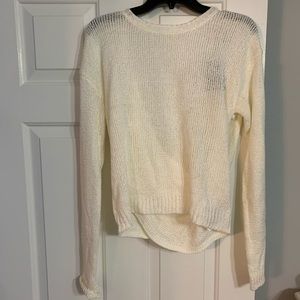 Cream low crisscross back sweater. Size M.